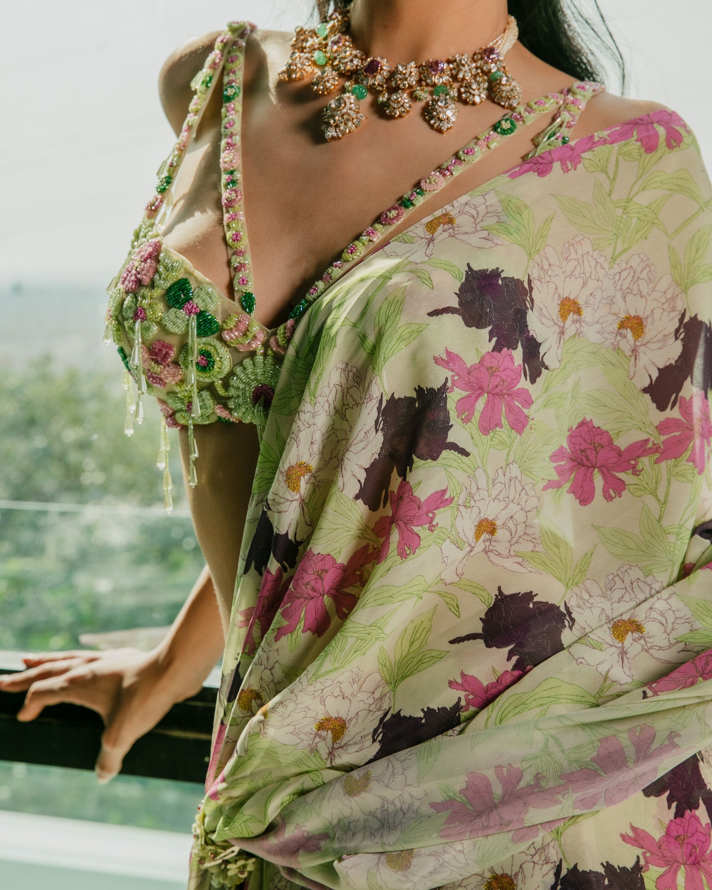 Pre draped ruffle saree with a cutout embroidered blouse