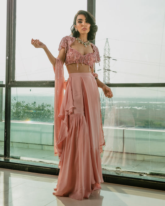 Embroidered cap sleeve blouse with draped sharara pants and a sequence & Pearl stole